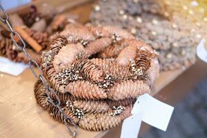 Handcrafted Christmas wreaths at a European Cristmas market photo