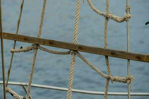 a rope ladder on a sailboat photo