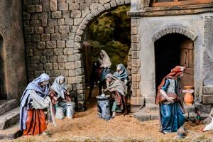 a nativity scene with people in it photo