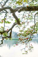 Hoan Kiem Lake - Ho Guom or Sword lake in the center of Hanoi in the fog in the morning. photo