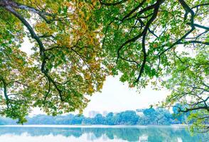 Hoan Kiem Lake - Ho Guom or Sword lake in the center of Hanoi in the fog in the morning. photo