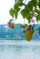 Hoan Kiem Lake - Ho Guom or Sword lake in the center of Hanoi in the fog in the morning. photo