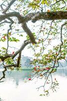 Hoan Kiem Lake - Ho Guom or Sword lake in the center of Hanoi in the fog in the morning. photo