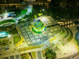 Aerial panorama view of Sunflower Building at Lam Vien Square in Da Lat City. Tourist city in developed Vietnam. Center Square of Da Lat city with Xuan Huong lake photo