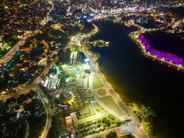 Aerial panorama view of Sunflower Building at Lam Vien Square in Da Lat City. Tourist city in developed Vietnam. Center Square of Da Lat city with Xuan Huong lake photo