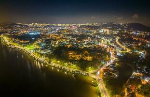 Aerial panorama view of Sunflower Building at Lam Vien Square in Da Lat City. Tourist city in developed Vietnam. Center Square of Da Lat city with Xuan Huong lake photo