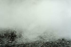 gravel texture floor with mist or fog. Light, dark and gray abstract gravel texture for display products photo