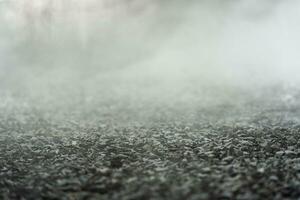 gravel texture floor with mist or fog. Light, dark and gray abstract gravel texture for display products photo