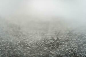 gravel texture floor with mist or fog. Light, dark and gray abstract gravel texture for display products photo