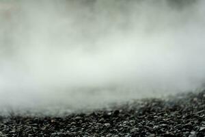 gravel texture floor with mist or fog. Light, dark and gray abstract gravel texture for display products photo