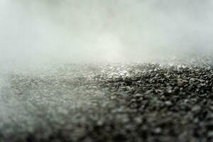 gravel texture floor with mist or fog. Light, dark and gray abstract gravel texture for display products photo