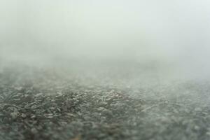 gravel texture floor with mist or fog. Light, dark and gray abstract gravel texture for display products photo