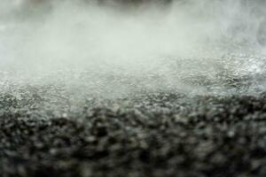 gravel texture floor with mist or fog. Light, dark and gray abstract gravel texture for display products photo