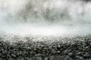 gravel texture floor with mist or fog. Light, dark and gray abstract gravel texture for display products photo