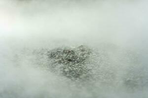 gravel texture floor with mist or fog. Light, dark and gray abstract gravel texture for display products photo