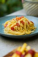 pasta spaghetti in plate and white table photo