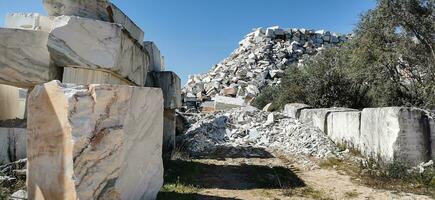 Huge blocks of stone in an operating quarry photo