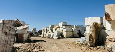 Huge blocks of stone in an operating quarry photo