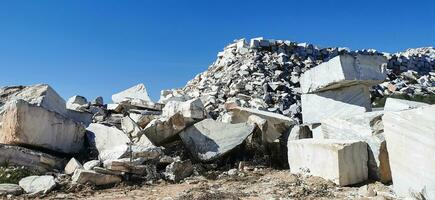 Huge blocks of stone in an operating quarry photo