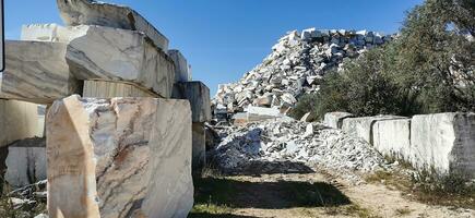 Huge blocks of stone in an operating quarry photo