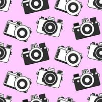 Bright seamless pattern of three black and white cameras of different shapes on a pastel pink background. Doodle retro film camera, wrapping paper, background. vector