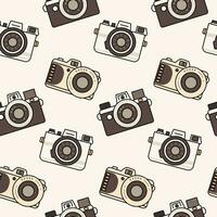 Seamless pattern of three vintage cameras of different shapes and shades, isolated on a light background. Background in retro colors, backdrop, wrapping paper, sepia tone. vector