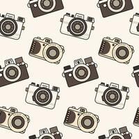 Seamless pattern of three vintage cameras of different shapes and shades, isolated on a light background. Background in retro colors, backdrop, wrapping paper, sepia tone. vector