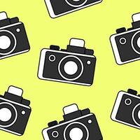 Bright seamless pattern minimalistic black and white camera on a yellow background. Doodle retro film camera, wrapping paper, background. vector