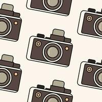Minimalistic seamless pattern brown vintage camera in retro colors, isolated on a light background. Background, backdrop, wrapping paper, sepia tone. vector