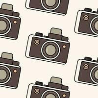 Minimalistic seamless pattern brown vintage camera in retro colors, isolated on a light background. Background, backdrop, wrapping paper, sepia tone. vector