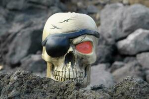 a skull with an eye patch on it photo