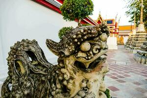 a statue of a dragon in a temple photo