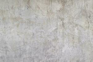 Blank concrete white rough wall for background. Beautiful white wall surface background pattern. photo