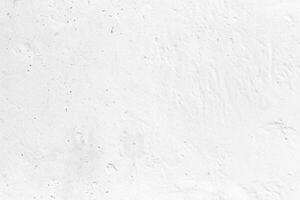 Blank concrete white rough wall for background. Beautiful white wall surface background pattern. photo