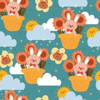 seamless pattern cartoon bunny inside a basket with sky element. cute animal wallpaper for textile, gift wrap paper vector