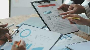 Finance manager meeting discussing company growth project success financial statistics, professional investor working start up project for strategy plan with document, laptop and digital tablet. video
