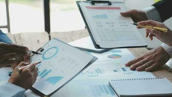 Finance manager meeting discussing company growth project success financial statistics, professional investor working start up project for strategy plan with document, laptop and digital tablet. video