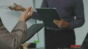 Finance manager meeting discussing company growth project success financial statistics, professional investor working start up project for strategy plan with document, laptop and digital tablet. video