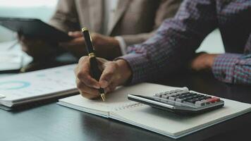 Finance manager meeting discussing company growth project success financial statistics, professional investor working start up project for strategy plan with document, laptop and digital tablet. video