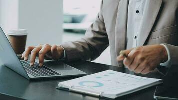 Business team collaboration discussing working analyzing with financial data and marketing growth report graph in team, presentation and brainstorming to strategy planning making profit of company. video