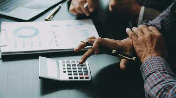 Business team collaboration discussing working analyzing with financial data and marketing growth report graph in team, presentation and brainstorming to strategy planning making profit of company. video