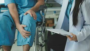 Physiotherapist instructing the patient during exercise video