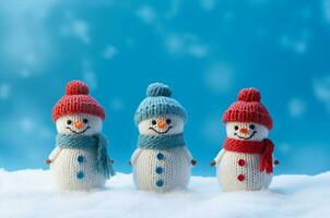 AI generated Knitted snowmen stand in the snow photo