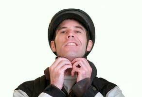 Bicyclist Adjusts Helmet Straps Before a Ride photo