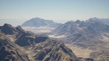 A view of a mountain range from an airplane photo