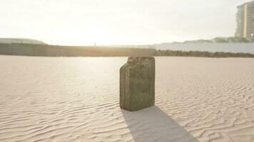 old rusted fuel can on the beach photo