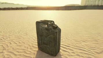 old rusted fuel can on the beach photo