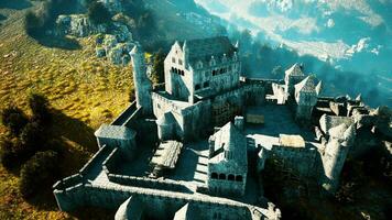 Beautiful drone view of the old castle with park on the hill photo