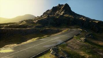 Scenic view of empty road amidst volcanic landscape photo