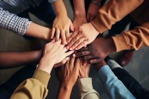 AI generated Teamwork. Close up of diverse businesspeople putting their hands together, A group of diverse hands together joining concept, captured from a top view, AI Generated photo